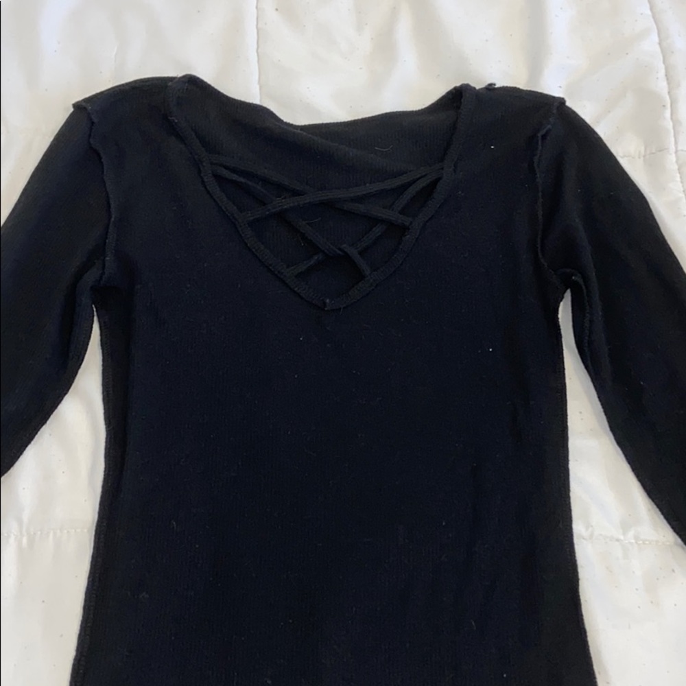 black long sleeve with cross in the front